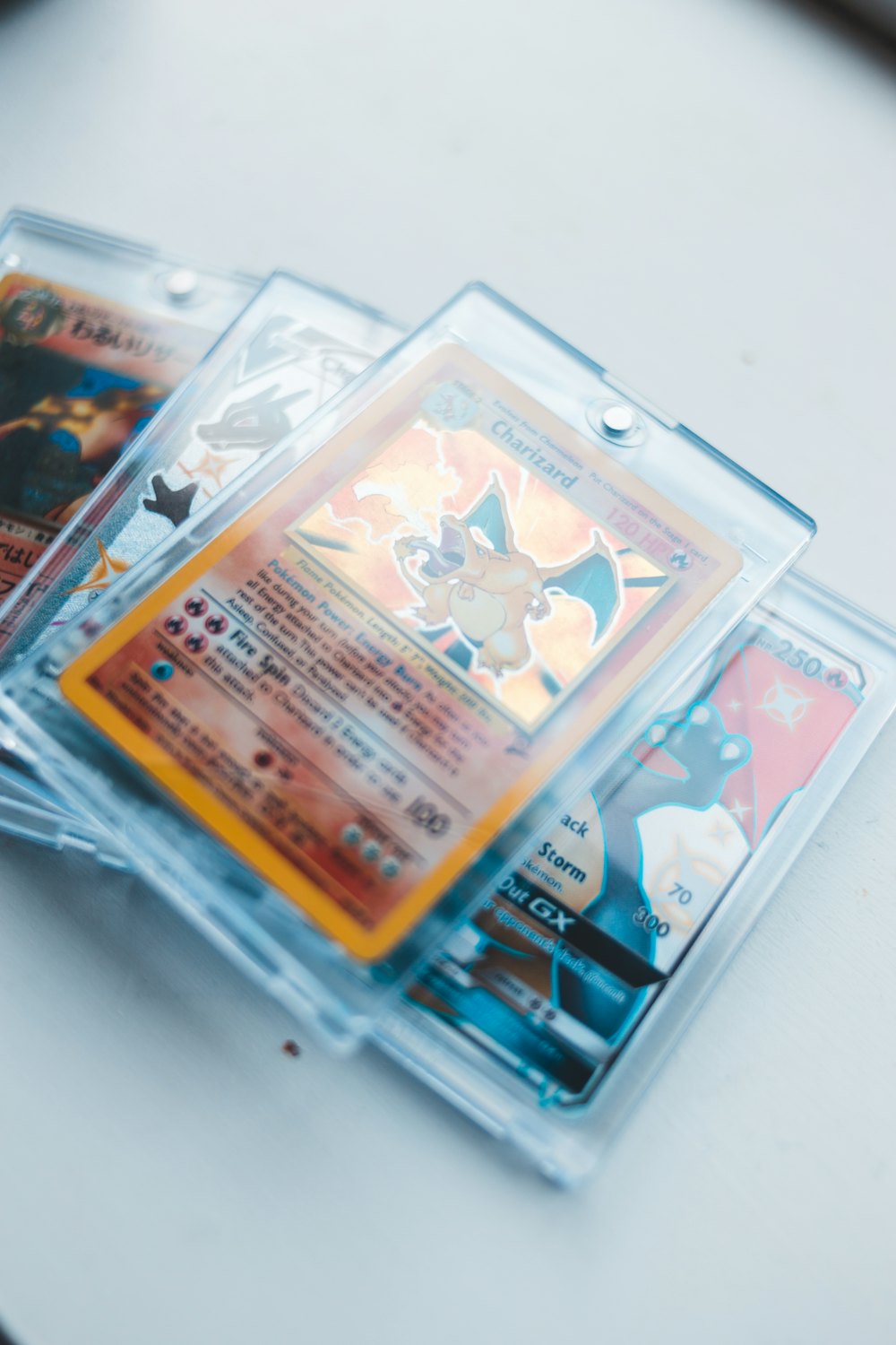 Graded trading cards sealed in rigid protective card cases